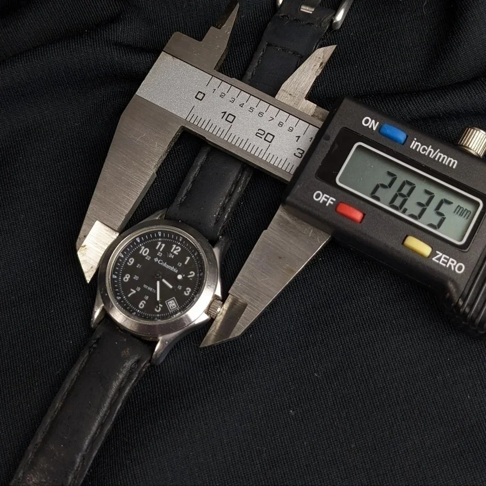 Vintage Columbia stainless steel 100m quartz watch, analog, 24hr, date, black
